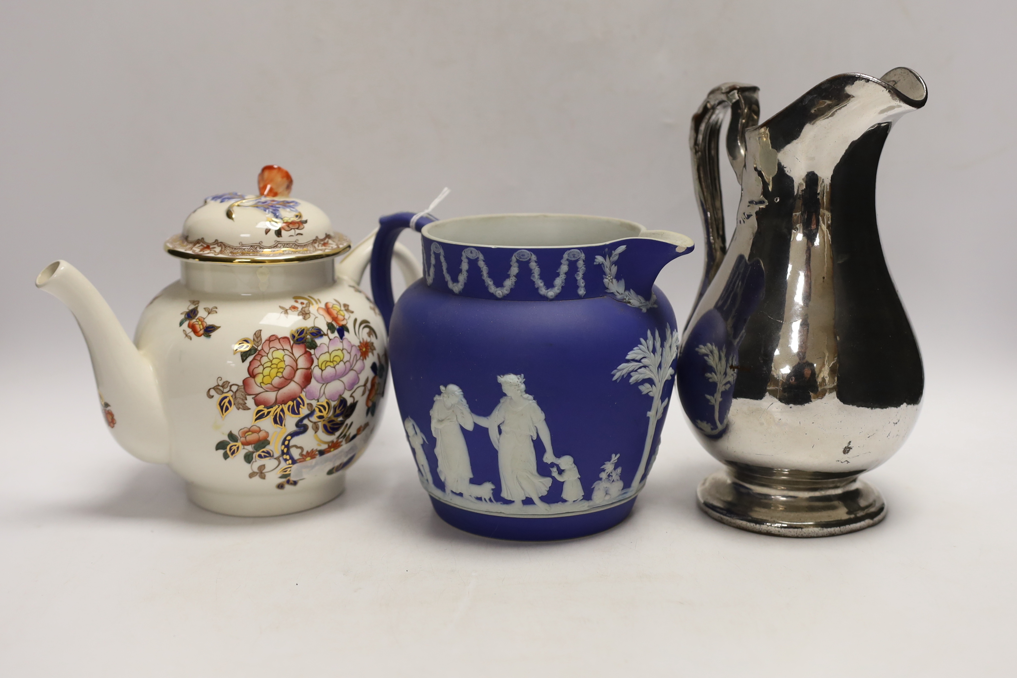 Nine ceramic items including two Dutch blue and white wall plaques, a silvered jug, a teapot, four items of lustreware and a Wedgwood jug, tallest 23cm